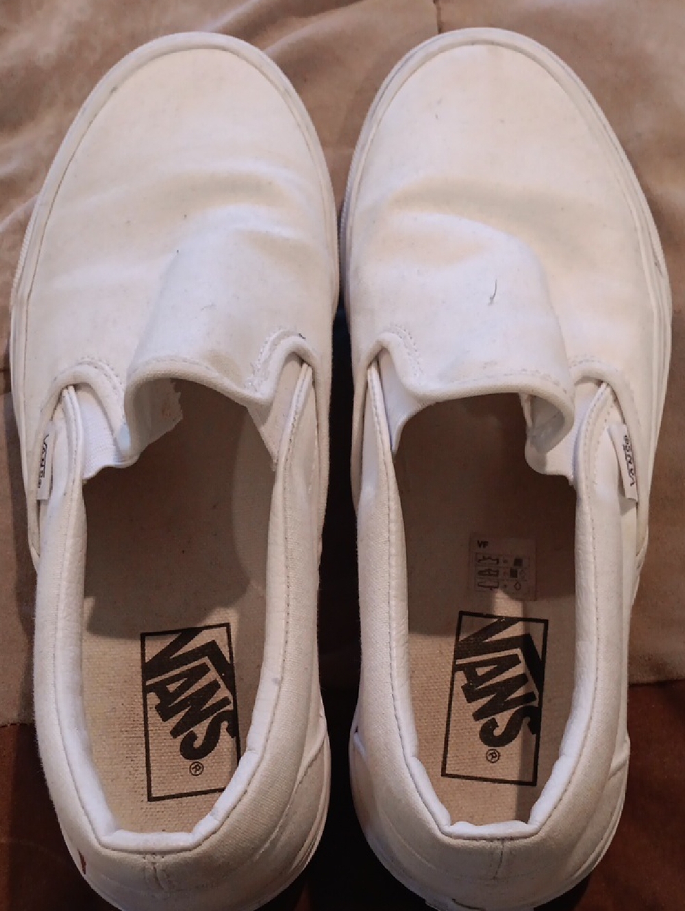 Vans White Slip-On Canvas Sneakers